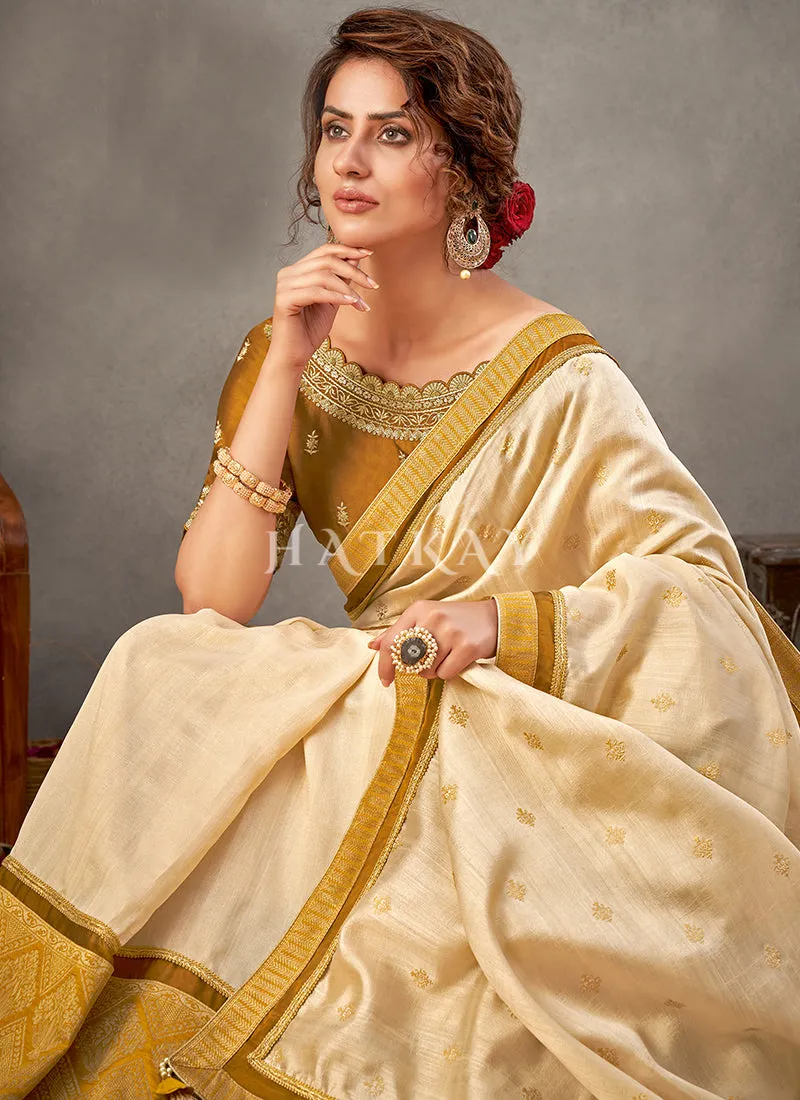 Cream And Yellow Zari Embroidery Silk Saree