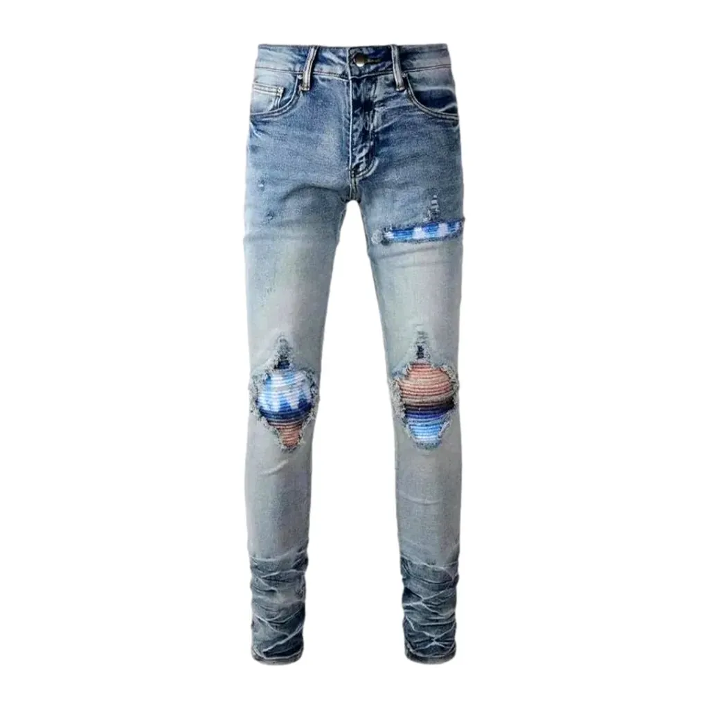 Distressed vintage mid-rise riding men's jeans