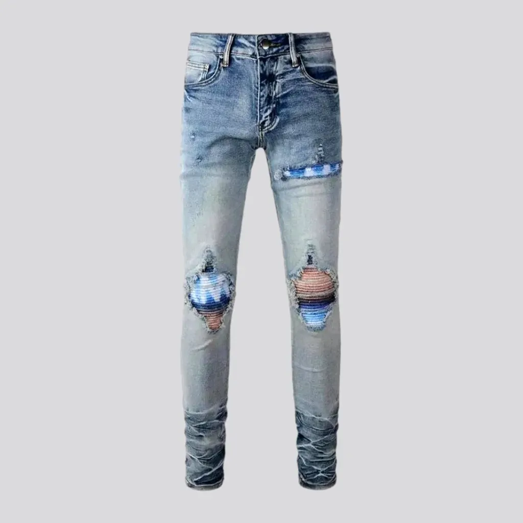 Distressed vintage mid-rise riding men's jeans