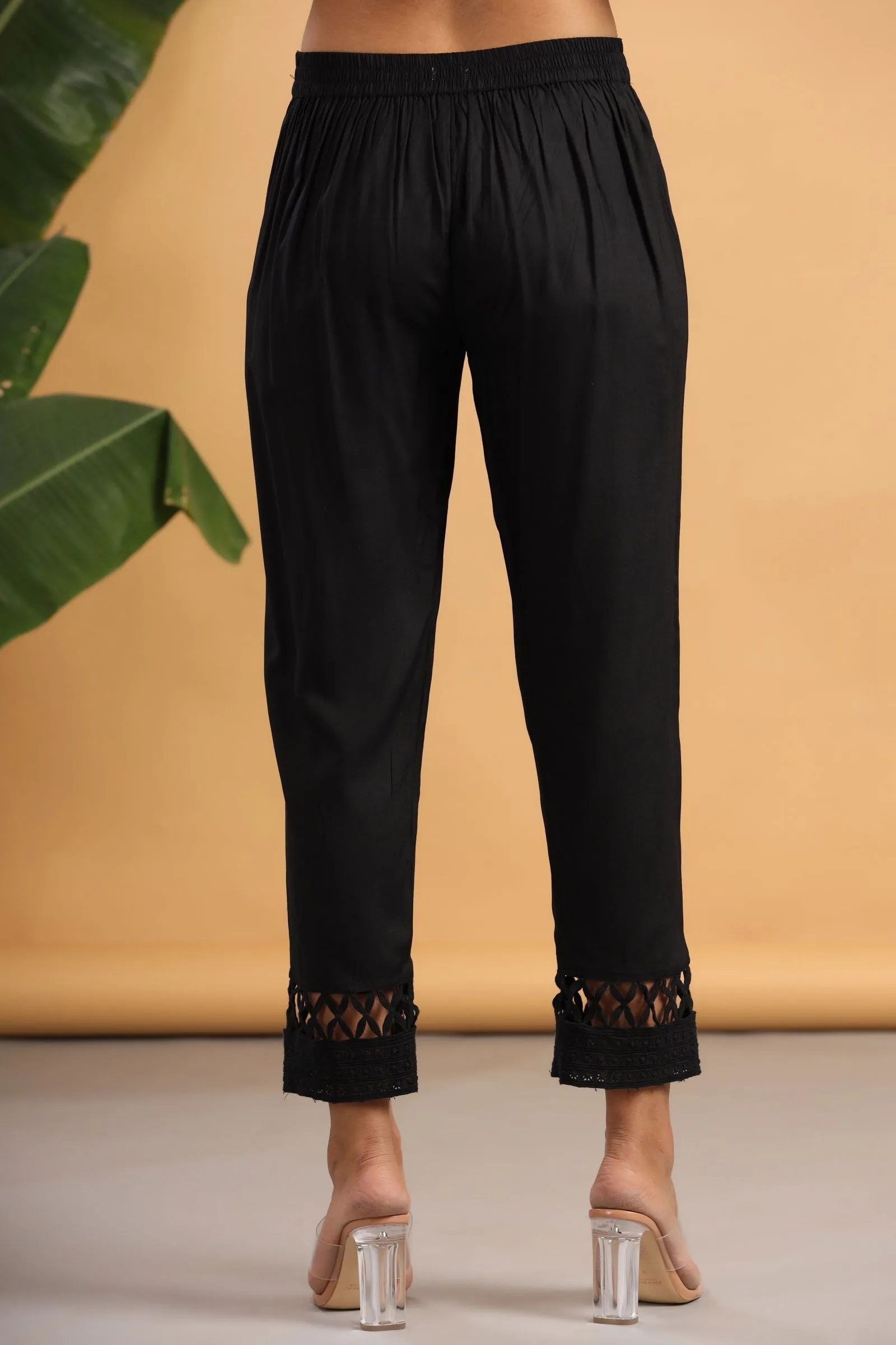 Jashvi Black Solid Rayon Ankle-Length Slim Fit Pants.