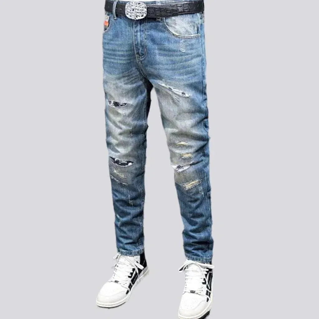 Small skulls embroidery jeans
 for men